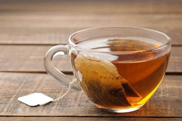 Tea Bag Glass Cup Brown Wooden Background Make Tea — Stock Photo, Image