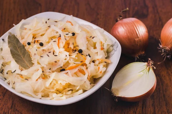 Salad Sauerkraut Carrots Laurel Leaves Black Pepper Cumin White Plate — Stock Photo, Image