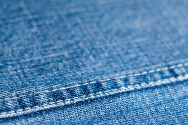 Doku mavi kot malzeme dikiş yakın çekim, seçici odak ile