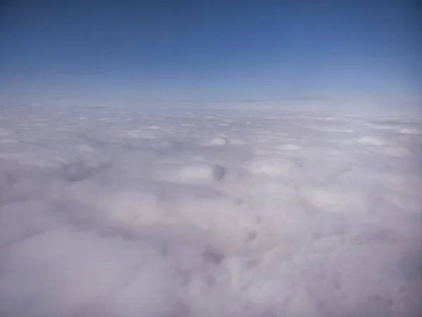 Cotton clouds under blue sky horizon, peace feeling