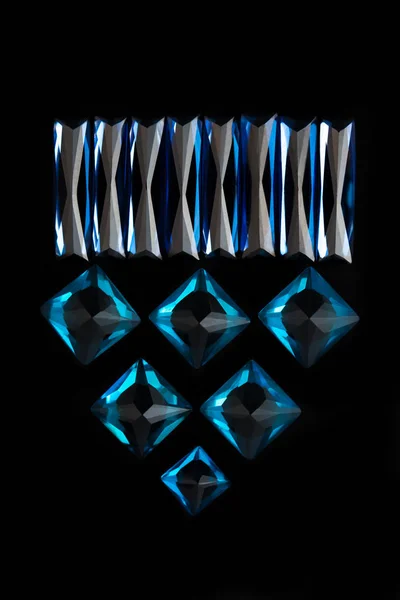 Set of beautiful blue sapphires minerals, gemstones on dark background. Luxury jewelry concept.  Sapphire precious stones.