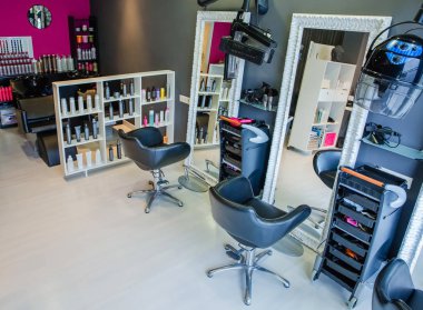 Interior of empty modern hair and beauty salon clipart