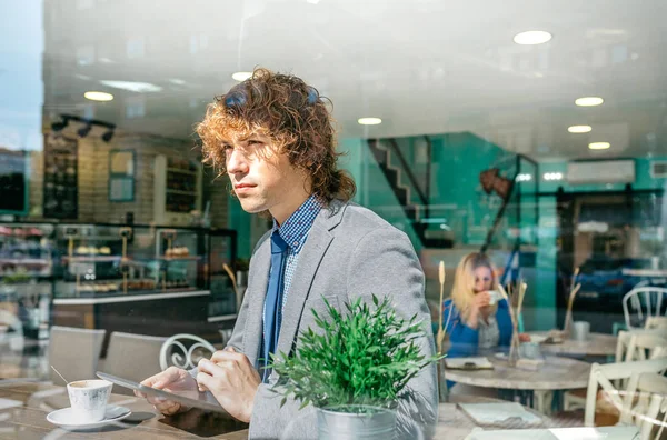 Businessman pausing for coffee — Stock Photo, Image