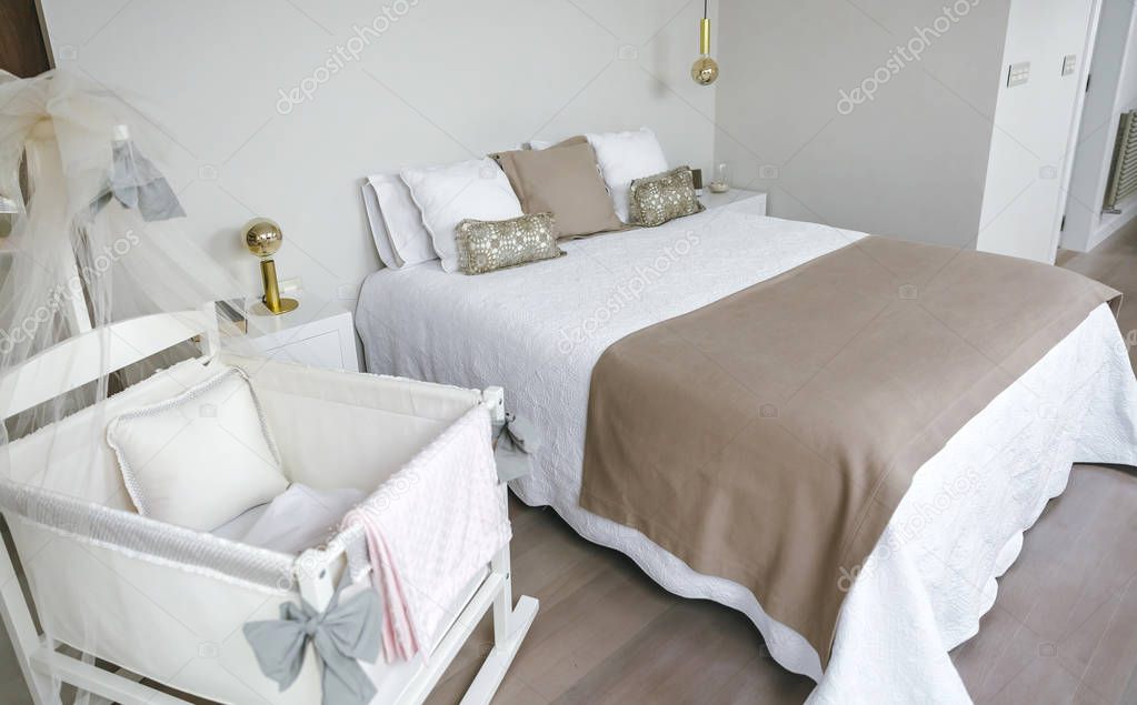 Bedroom with double bed and cot