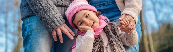 Little girl enjoying with her fathers in the forest — Stock Photo, Image