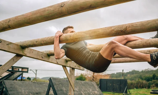 Participant in a obstacle course doing weaver — Stock Photo, Image