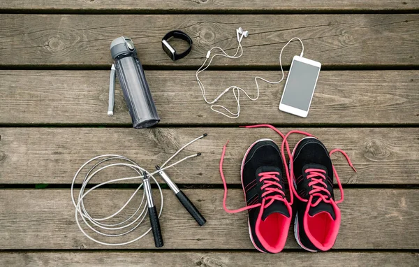 Set de equipamiento deportivo con zapatillas — Foto de Stock