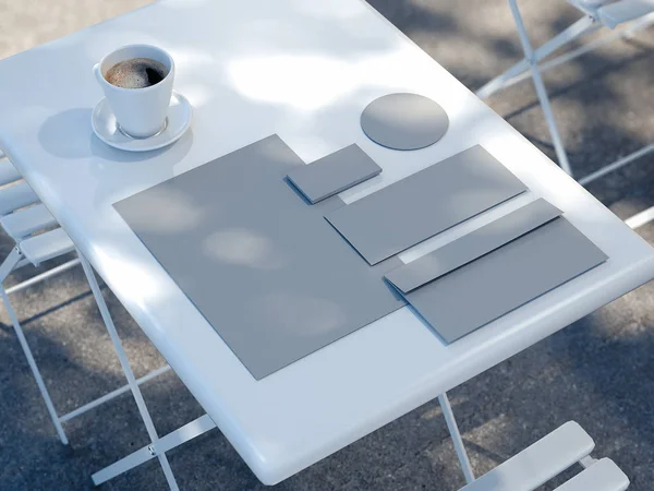 Maqueta de negocios en la mesa de la calle cerca de restaurante, 3d renderizado —  Fotos de Stock