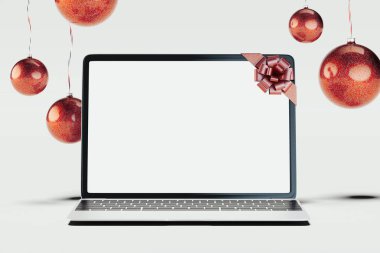 Black realistic laptop and Christmas balls on light background. 3d rendering. clipart