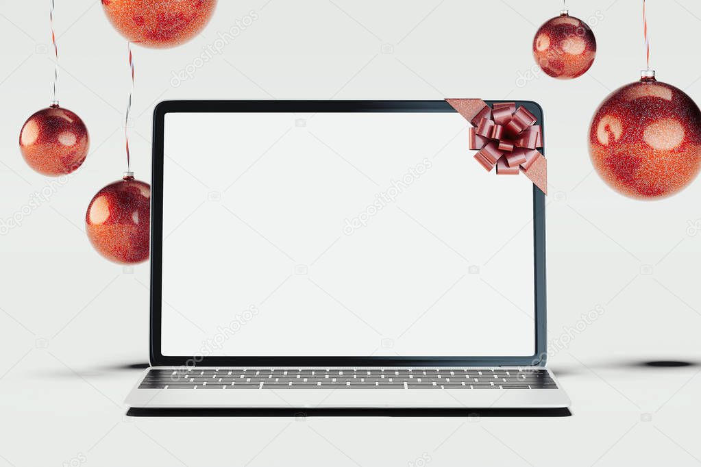 Black realistic laptop and Christmas balls on light background. 3d rendering.