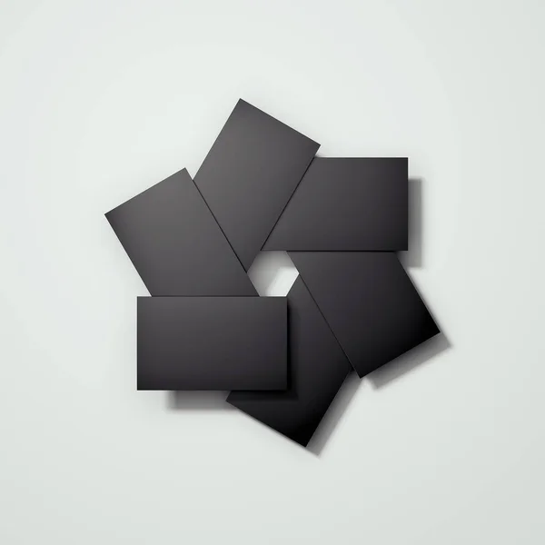Prázdné černé karty uspořádány ve fotoaparátu bránici tvar, vykreslování 3d objektů. — Stock fotografie