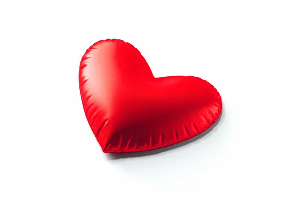 Red pillow in the form of heart isolated on white background. 3d rendering. — Stock Photo, Image