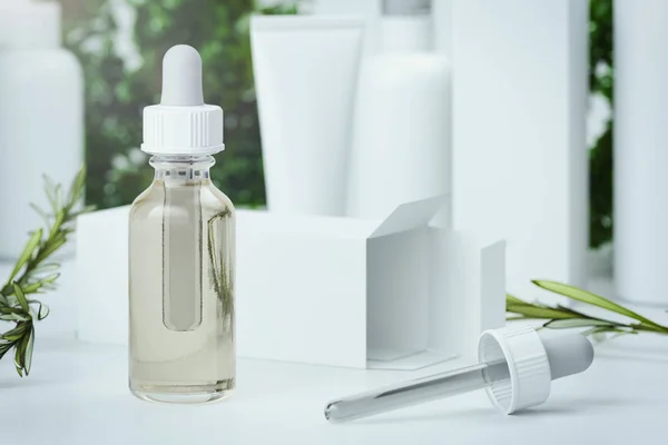 Bottle dropper with olive oil. glass container near Olive branch. 3d rendering. — Stock Photo, Image