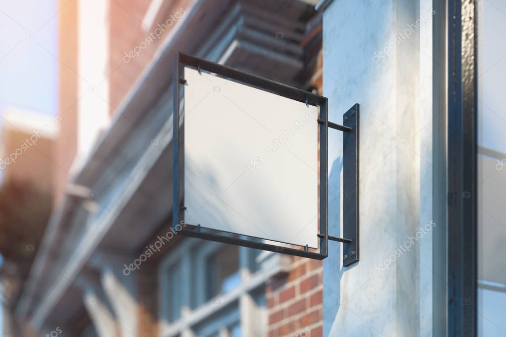Blank store signboard mockup. Empty shop signage template mounted on the wall. Street sign, 3d rendering.