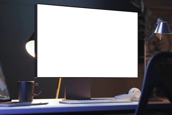 Black realistic pc with big blank white monitor, keyboard and earphones on desk under lamp light. 3d rendering.