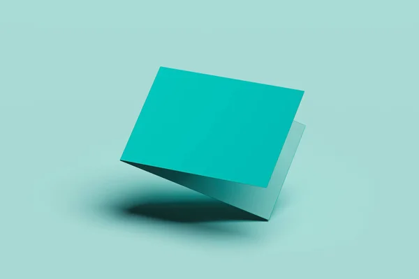 緑色の背景に分離された空白の折り畳まれたリーフレット。3D レンダリング. — ストック写真