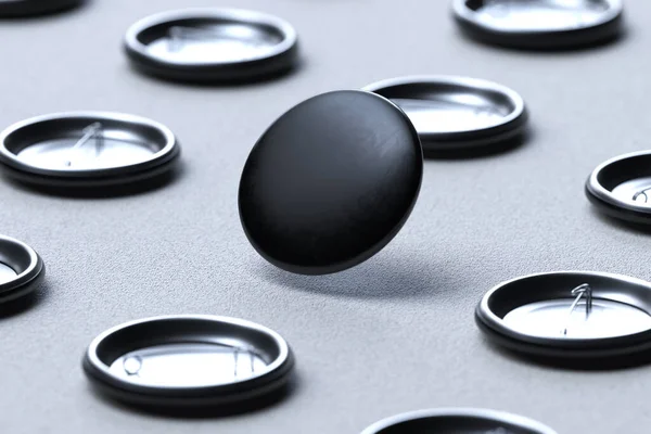 Black Blank Pin Buttons With Empty Space On Gray Background, One Brooch Turned By Front Side And Other Brooches Turned By Pin. 3d rendering — Stock Photo, Image