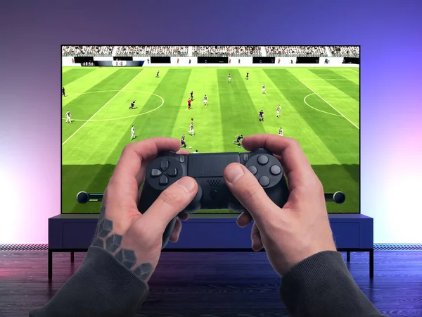 Close up of Man Hands Holding Wireless Joystick On Foreground. Modern TV Set With Football Soccer Video Game On Background. 3d rendering. — Stock Photo, Image