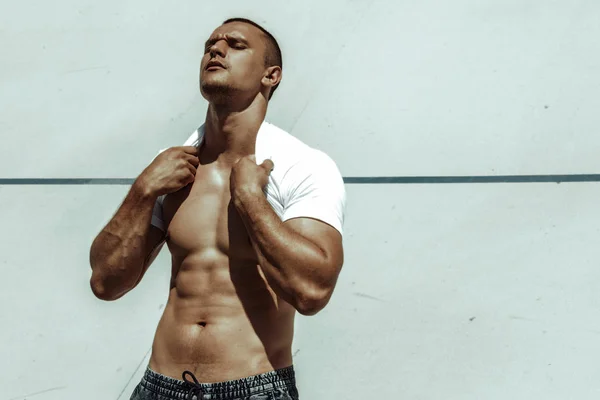 Stripped masculine male model street workout on a stadium — Stock Image Stripped Masculine Male Model Street Workout Stadium Stock Image