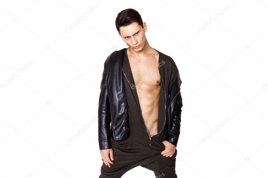 Strong muscle beautiful stripped male model in fashion casual cloathes on white isolated fontk background