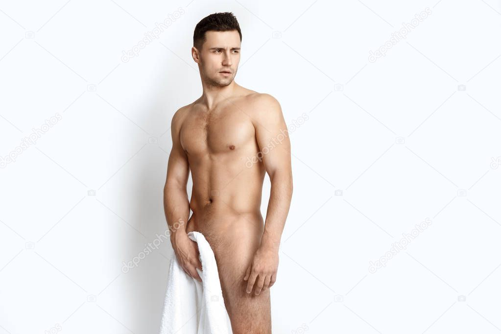 Sexy strong face sport muscle guy with white towel on white isolated font background