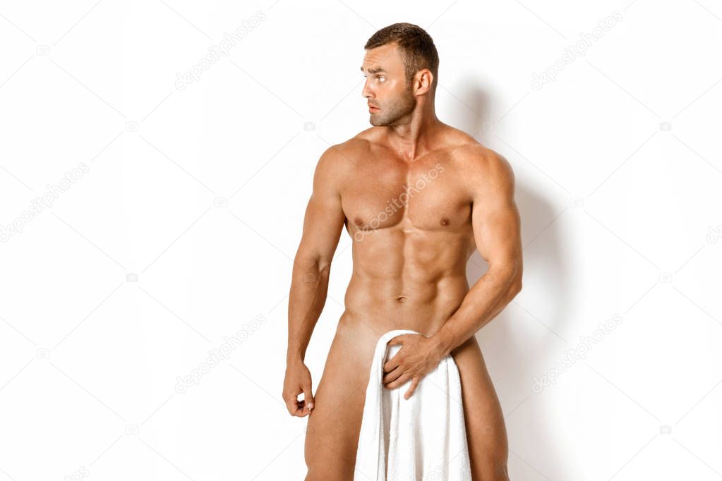 Sexy sport muscle guy with white towel on white isolated font background