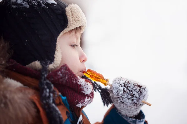 Little Baby Playing Eating Sweet Cockerel Winter Day Kids Play — Stock Photo, Image