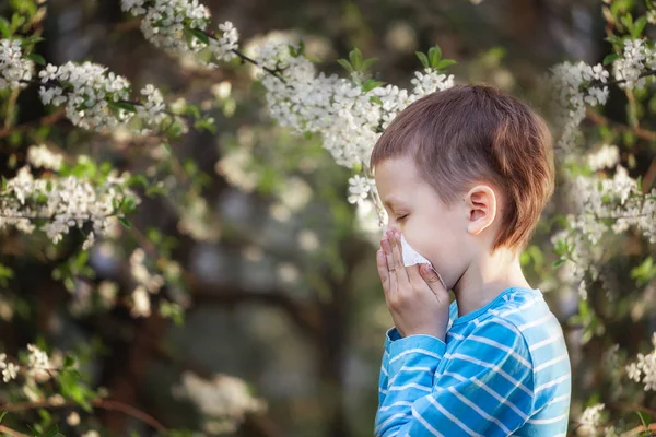 Boy Sneezes Park Background Flowering Tree Because Allergic Allergy Pollen — Stock Photo, Image