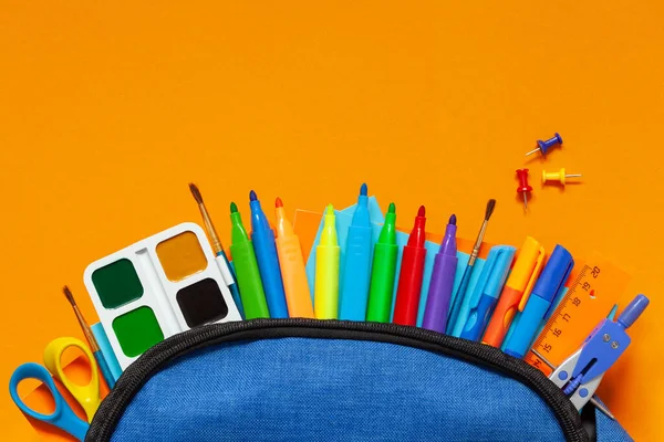 Full Blue School Backpack Different Supplies Orange Background Flat Lay — Stock Photo, Image