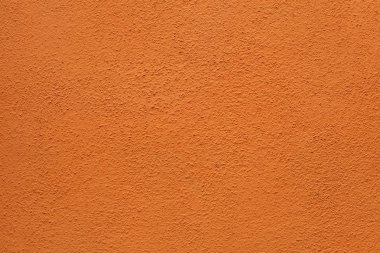 Turuncu sıva duvar boyalı. Arka plan doku.