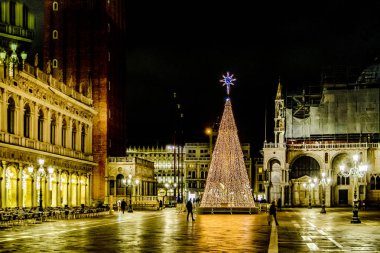 VENICE, ITALY, JANUARY - 2018 - Christmas time midnight scene at piazza san marcos with famous san marcos basilica at venice city, Italy clipart