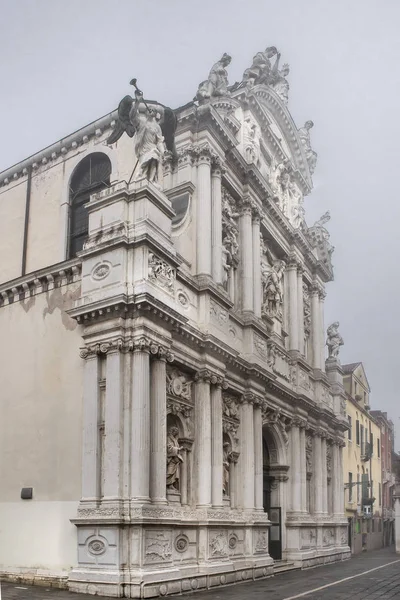 Winter day scene exterior view old baroque style church at historic center of venice, Italy
