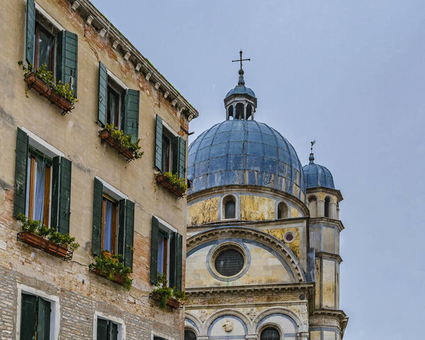 Apartment buildings and jewish synagogue urban scene at historic center of venice city, Italy