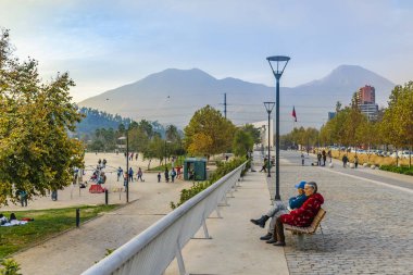 SANTIAGO DE CHILE, CHILE, MAY - 2018 - Urban autumn day scene at famous bicentennial park in santiago de chile city clipart