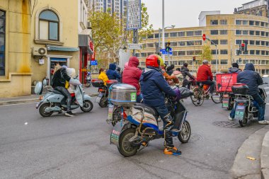 Motosiklet ve Bisikletçilerde insanlar, Şanghay, Çin