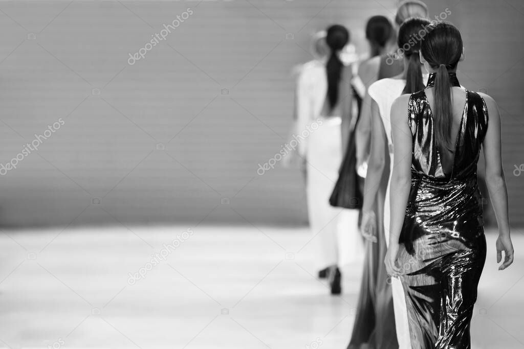 Fashion model during a fashion show, catwalk event, runway show.