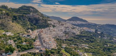 Frigiliana, Malaga, Andalusi, Spain - November 10, 2018: Panoramic view of the town Frigiliana, one of the white villages in the Anducia region, southern Spain clipart