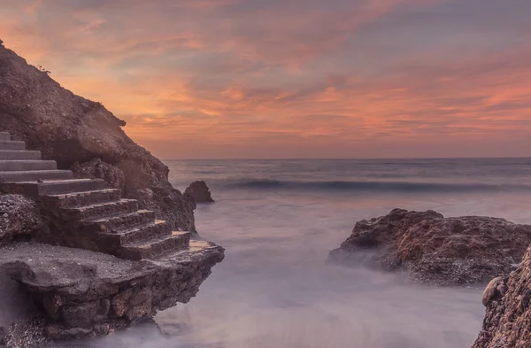 Staircase on the rocks of the coast — Stock Photo, Image