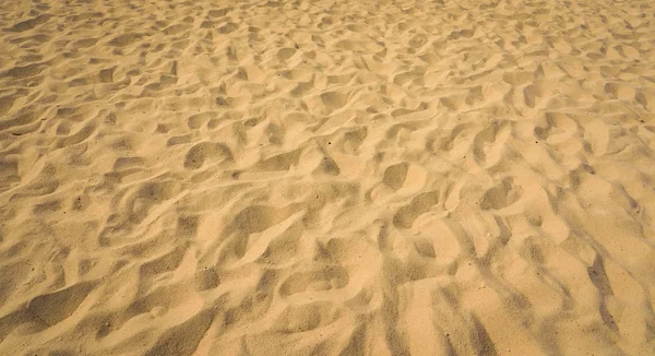 Closeup of sand pattern of a beach in the summer — Stock Photo, Image