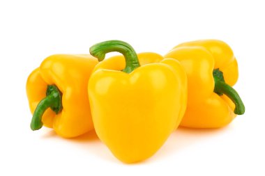 Beyaz arka planda üç tatlı biber.