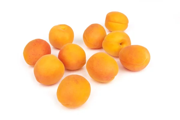 Apricots heap on white — Stock Photo, Image