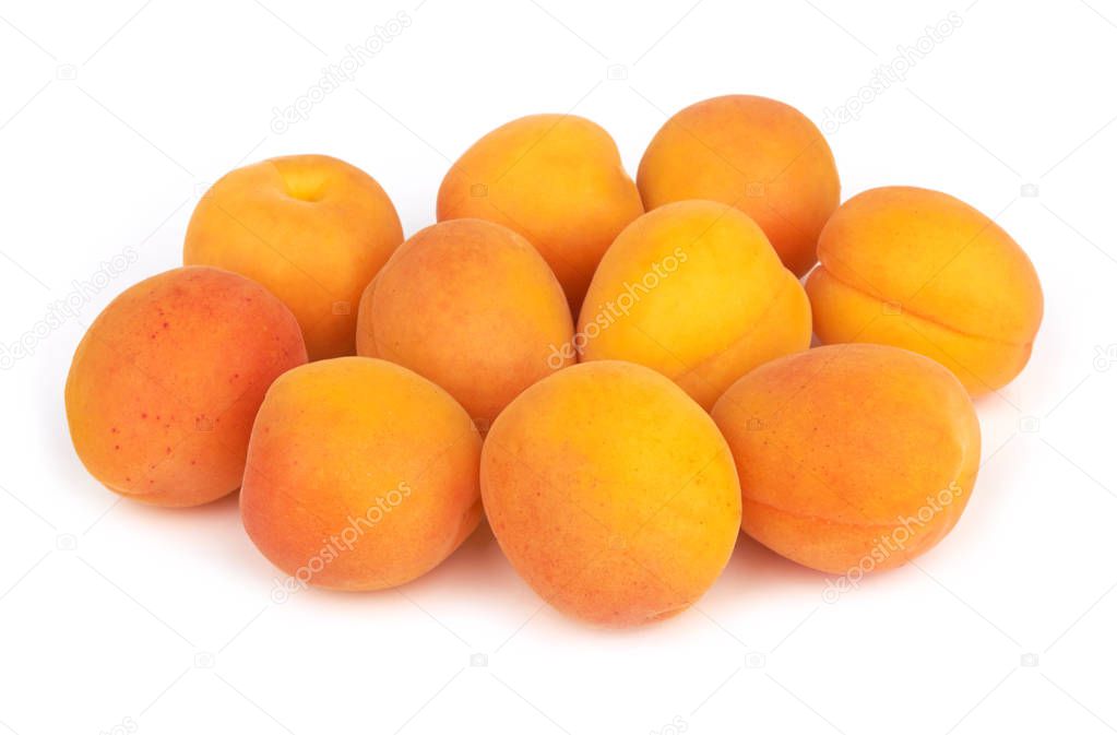 Apricots heap on white