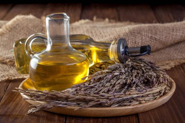 Rice bran petrol şişe cam ile ahşap üzerine tohum