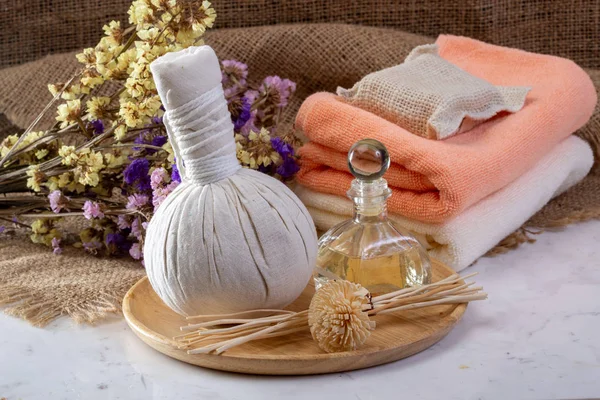 Spa herbal Compressing ball on marble background
