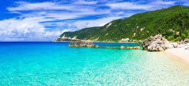 Best beaches of Lefkada island - Agios Nikitas with crystal clear water,Greece. clipart