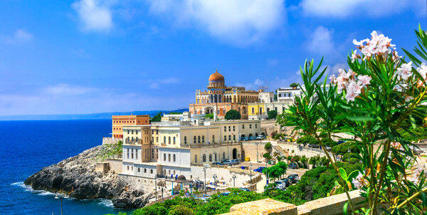 Santa Cesarea Terme - beautiful coastal town in Puglia, view with old castle and colorful houses, Italy
 