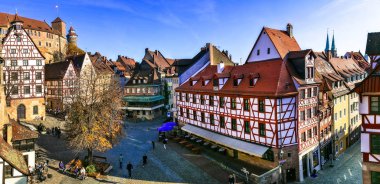 Landmarks of Germany- historic town Nurnberg in Bavaria. Old town,view with traditional houses and old castle. clipart