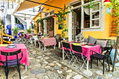 traditional colorful Greece series - cute taverns in Skiathos island clipart