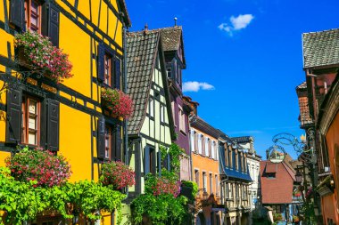 Traditional colorful half-timbered houses in Alsace. Riquewihr village,France. clipart