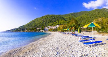 Relaxing beach scenery - Skopelos island, Neo Klima. Greece, Sporades. clipart